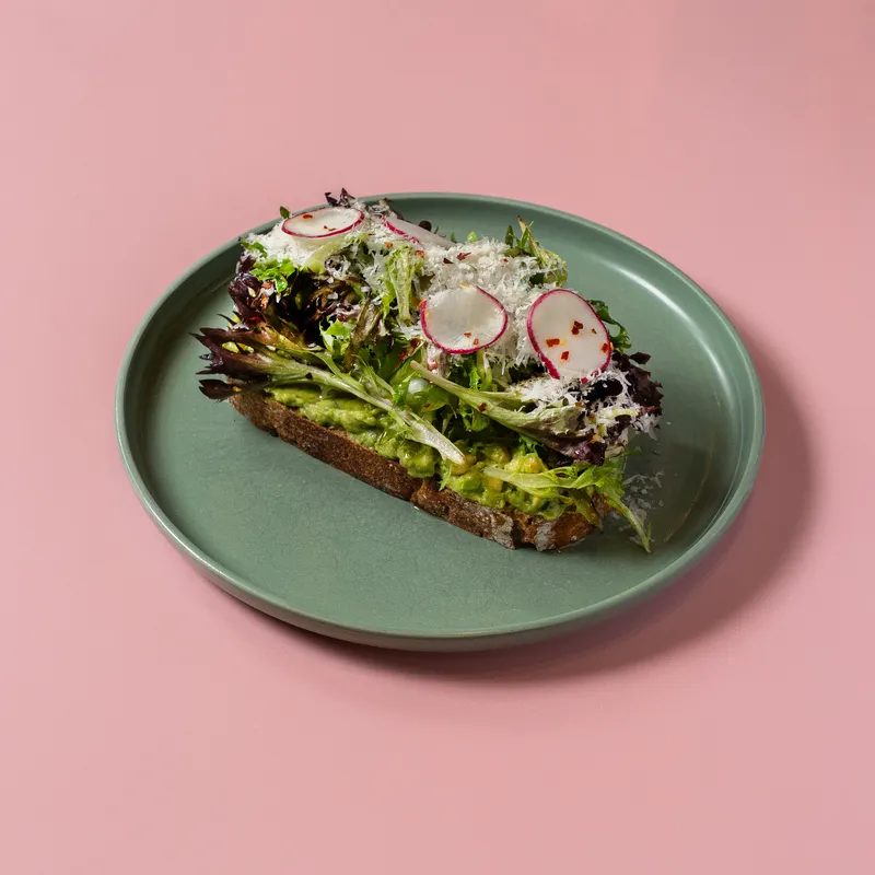 Avocado toast with radish and greens